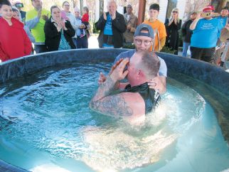 A baptism service to remember: Eight baptized Sunday at First Pentecostal  at tornado-wrecked church site